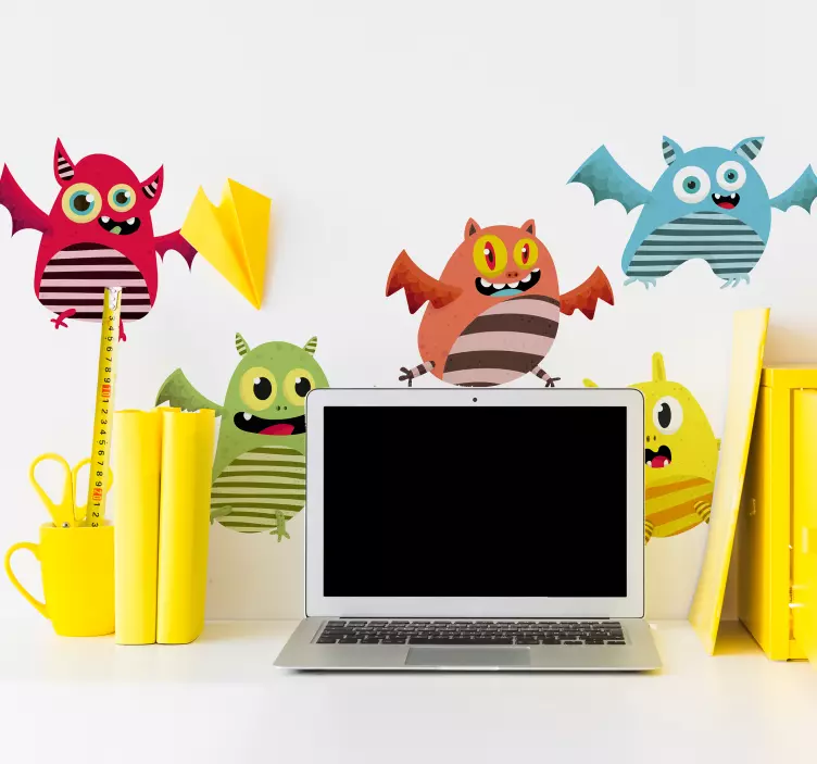 Vinilo infantil monstruos de colores voladores - TenVinilo