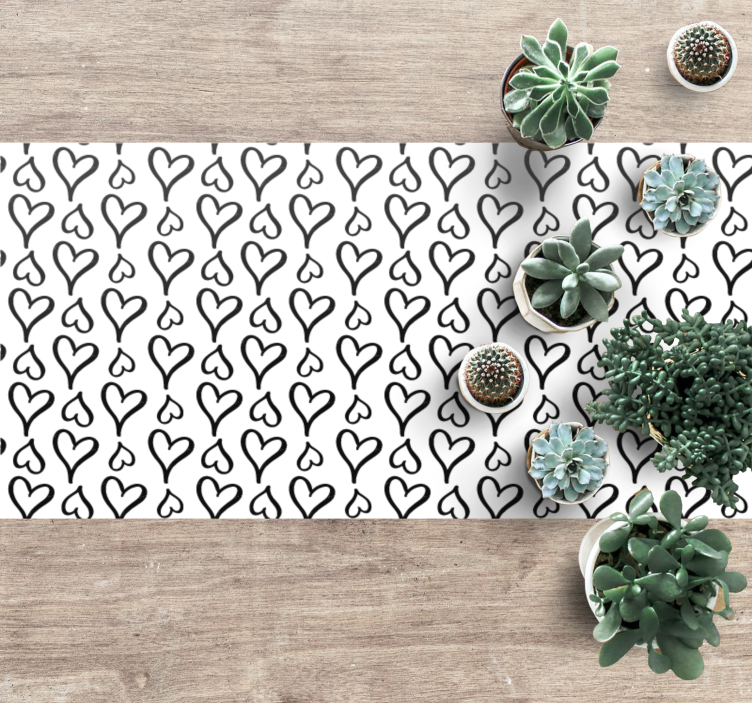 Alfombra vinílica imitación patrón de corazones negros - TenVinilo