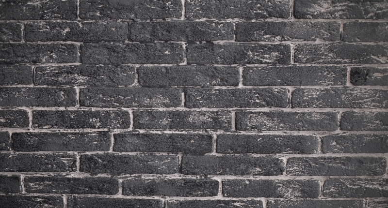 Alfombra vinílica dormitorio pared gris de ladrillos - TenVinilo